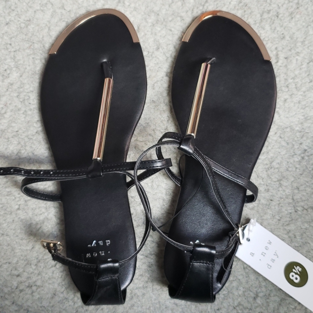 Black and gold sandals